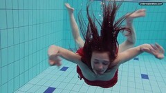 Cute naked girls underwater in the pool Thumb