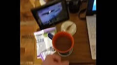 Cumming in my morning coffee and watching gay porn on my laptop computer Thumb