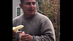 Straight construction man sucks banana Thumb