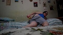 Fetish insertions: a banana in the gay hole watching TV Thumb